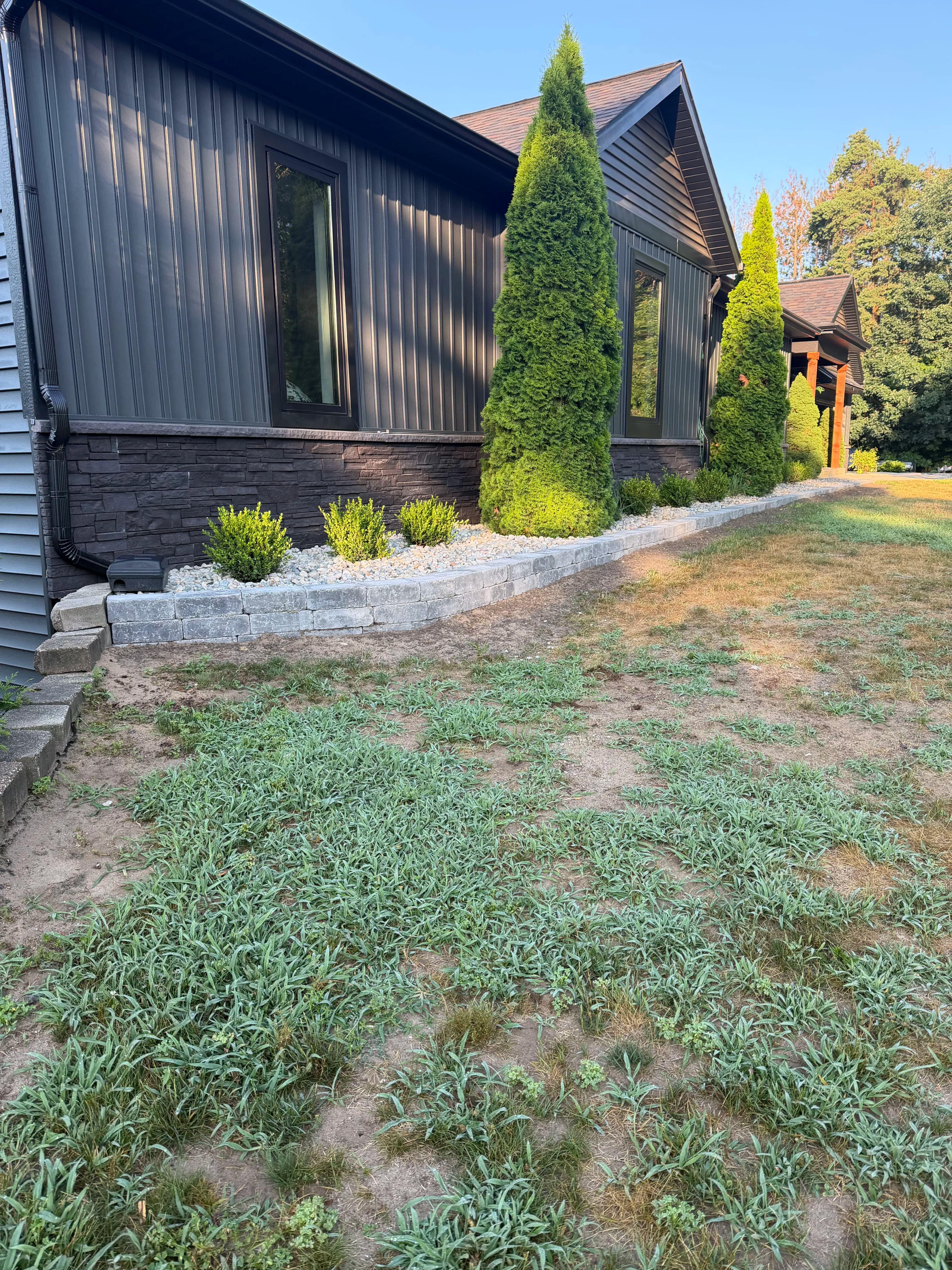 Project Brussels Block Bed Border With Stone and Fresh Plantings image