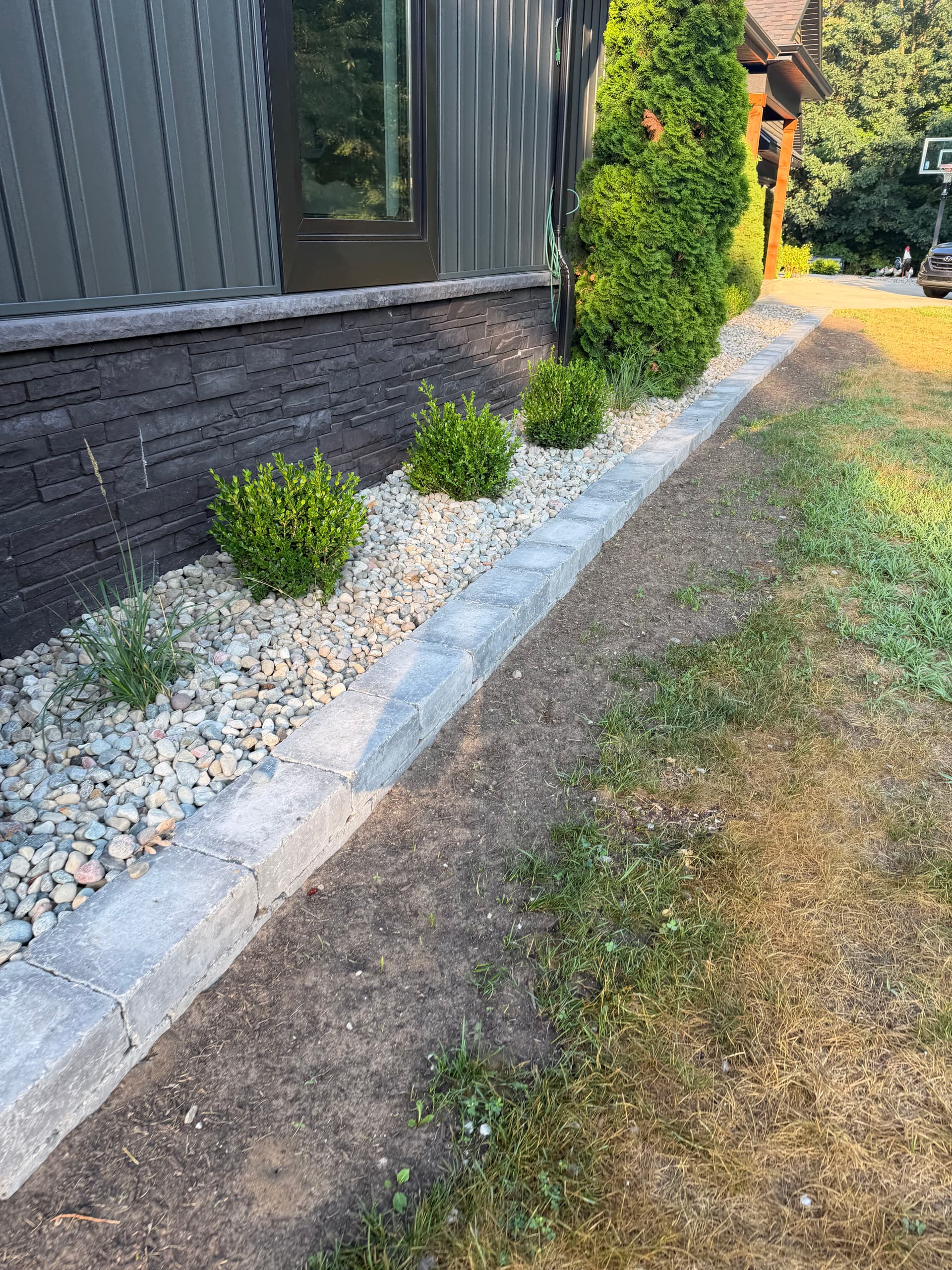 Gallery photos for Brussels Block Bed Border With Stone and Fresh Plantings: Image #2