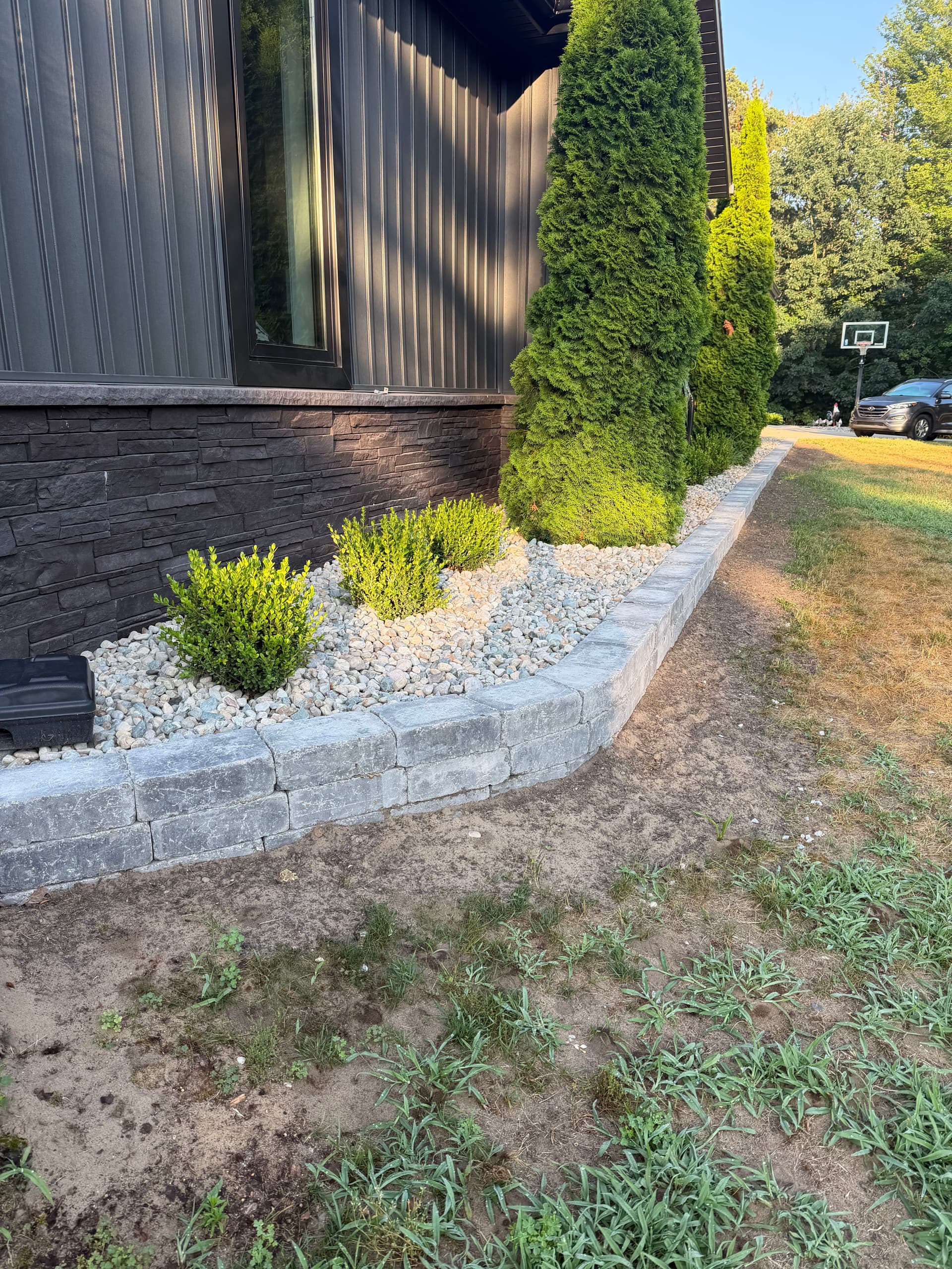 Gallery photos for Brussels Block Bed Border With Stone and Fresh Plantings: Image #1