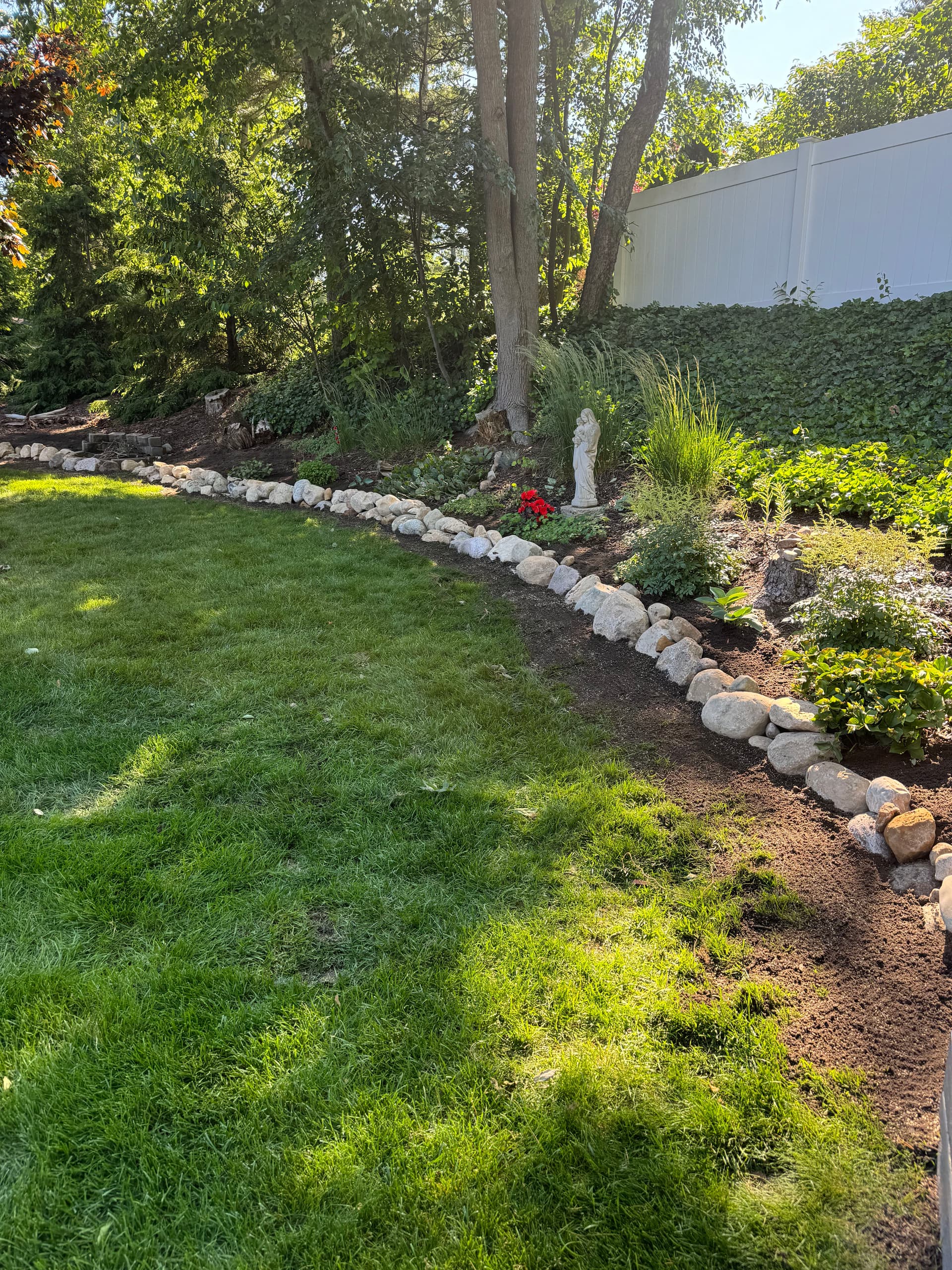 Gallery photos for Boulder Edging and New Plantings Give These Beds a Finished Look: Image #3