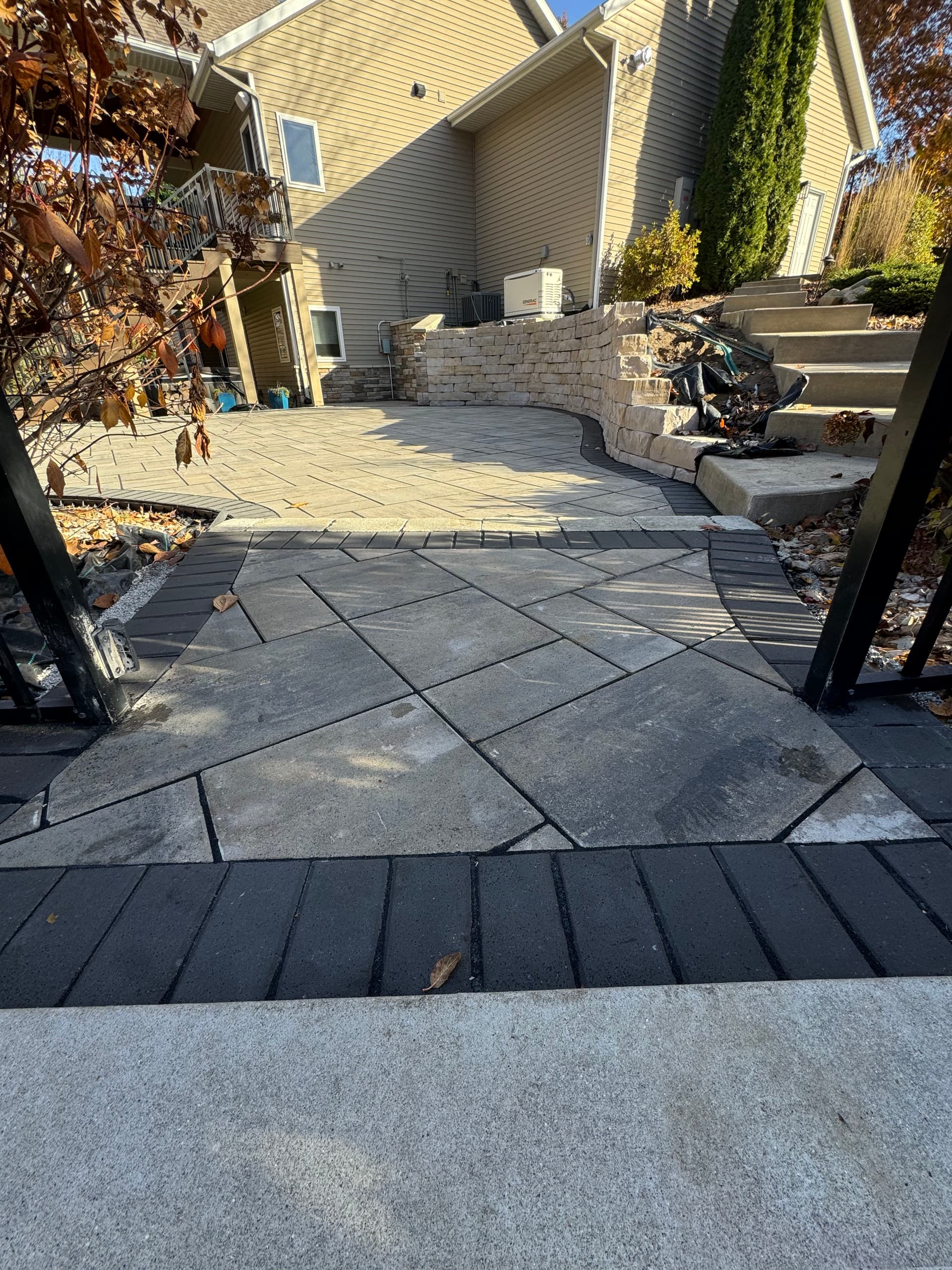 Gallery photos for Curved Retaining Wall and Paver Patio Built for Backyard Gatherings: Image #3