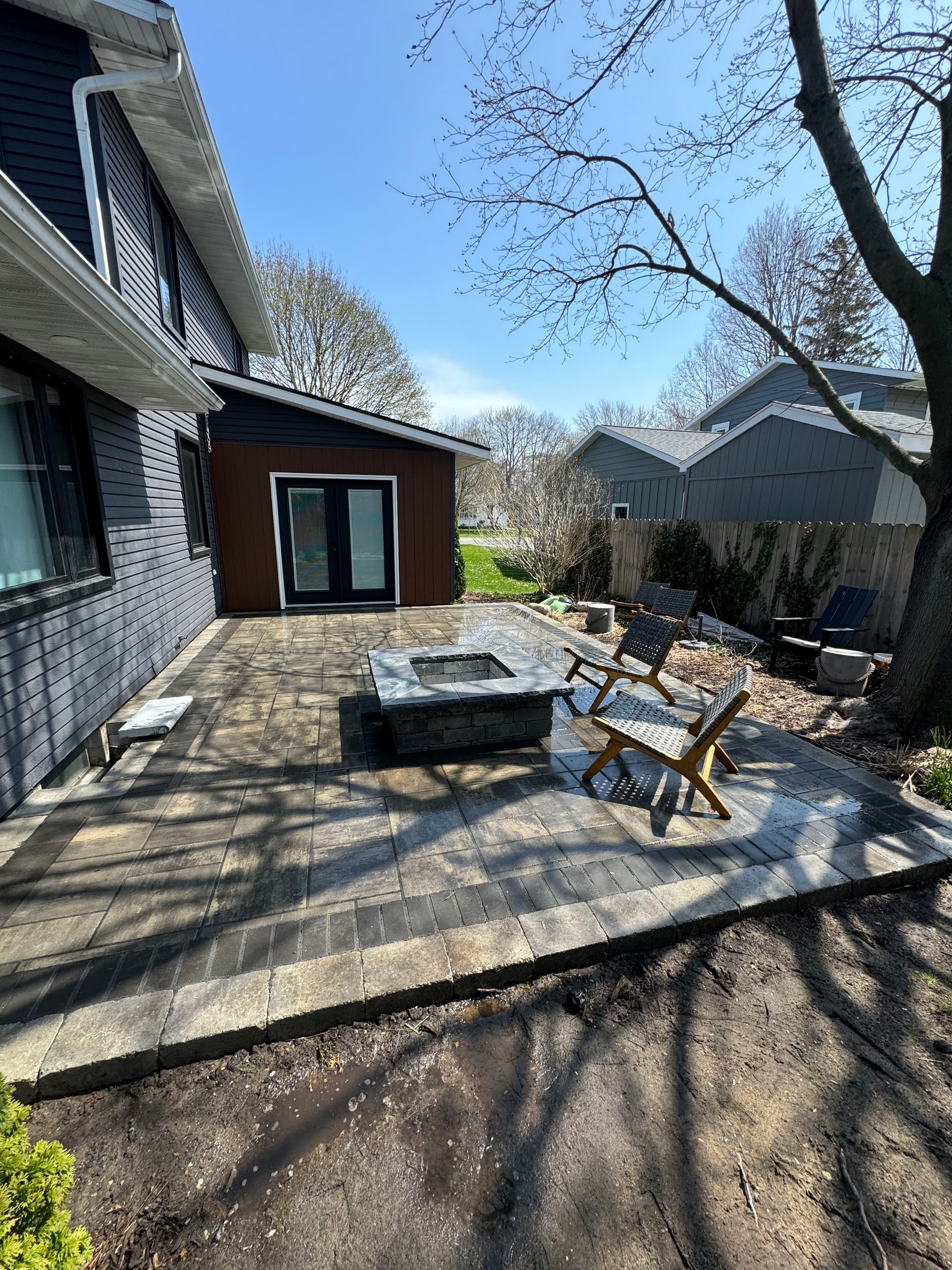 Gallery photos for Raised Paver Patio with Built-In Fire Pit at Deck Height: Image #1
